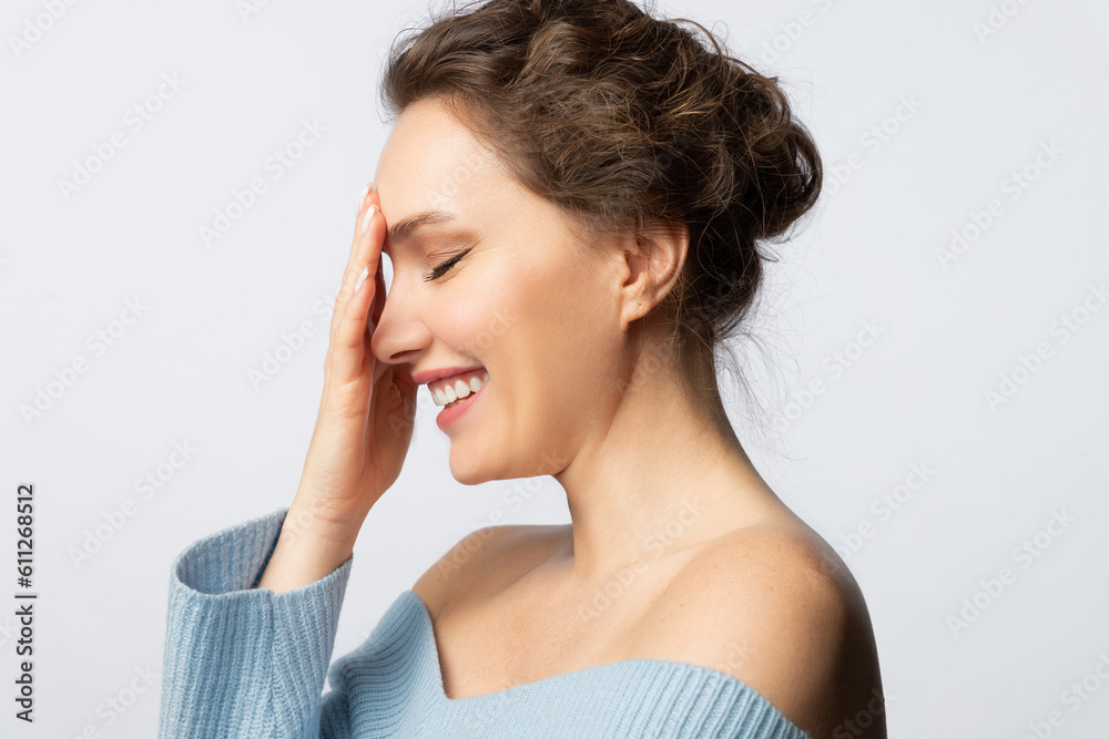 Beautiful happy woman with pure glowing skin and natural makeup Beautiful happy woman with pure glowing skin and natural makeup