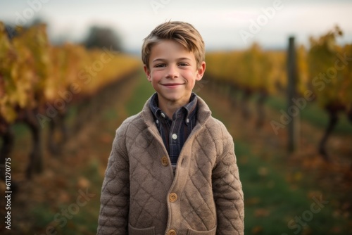 Medium shot portrait photography of a happy mature boy wearing a cozy sweater against a vineyard background. With generative AI technology