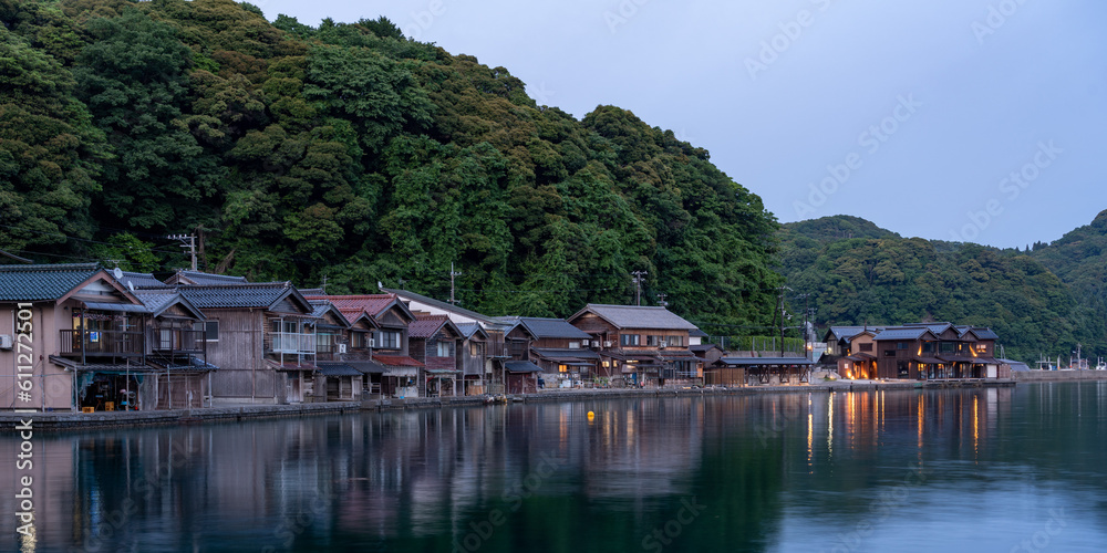Night view of traditional boathouses at Ine Town in Kyoto, Japan. Night view of traditional boathouses at Ine Town in Kyoto, Japan.