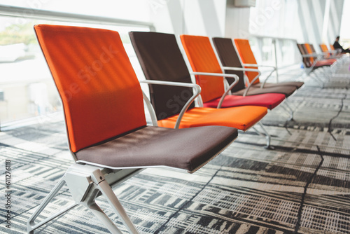 Photography Row of empty chairs at Changi airport, Singapore.