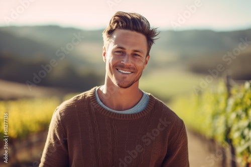 Close-up portrait photography of a satisfied boy in his 30s wearing a cozy sweater against a picturesque vineyard background. With generative AI technology