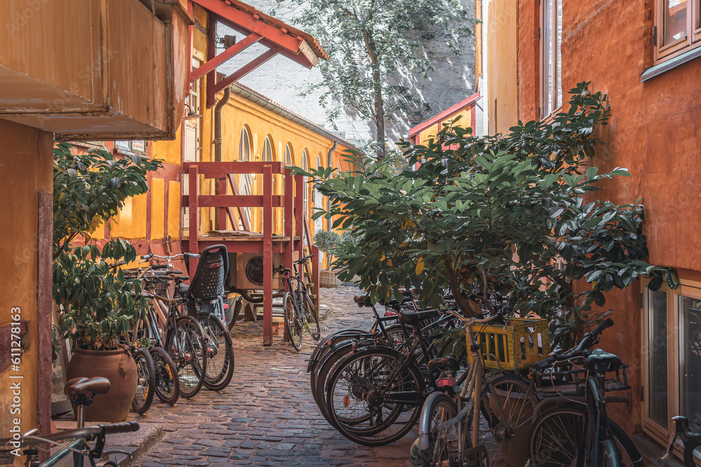 bicycle parking in the courtyard of the house on the old street of Copenhagen, Denmark