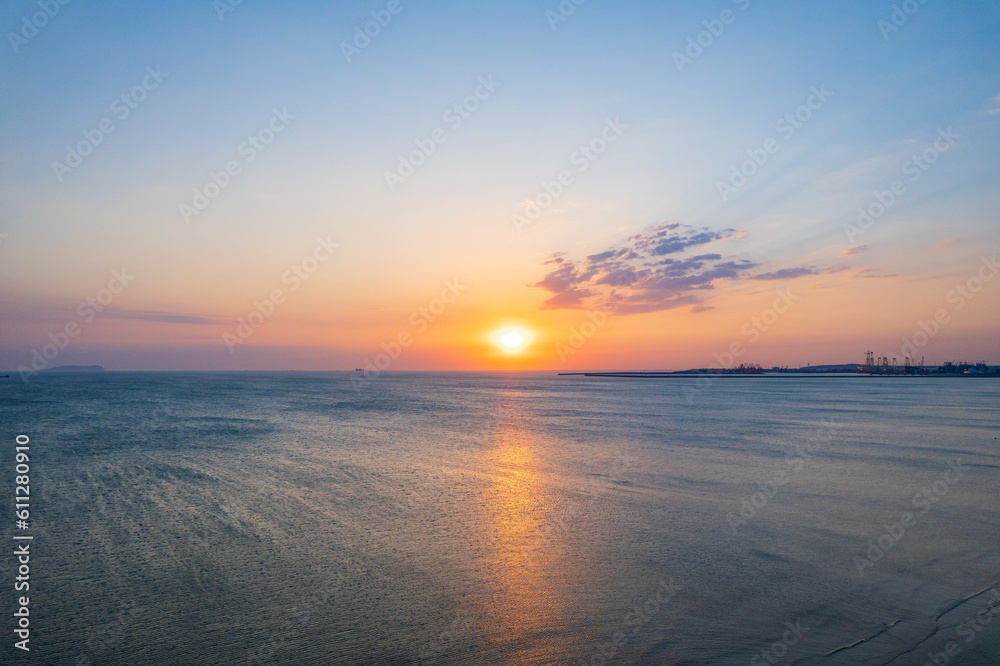 Sunrise over the sea in Penglai District, Yantai, Shandong Sunrise over the sea in Penglai District, Yantai, Shandong