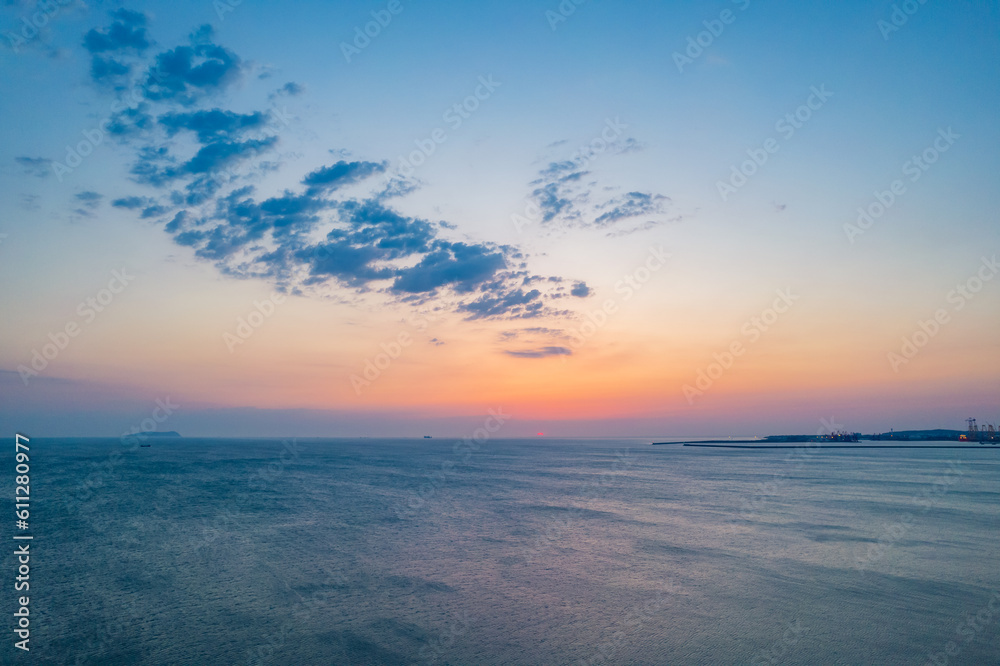 Sunrise over the sea in Penglai District, Yantai, Shandong