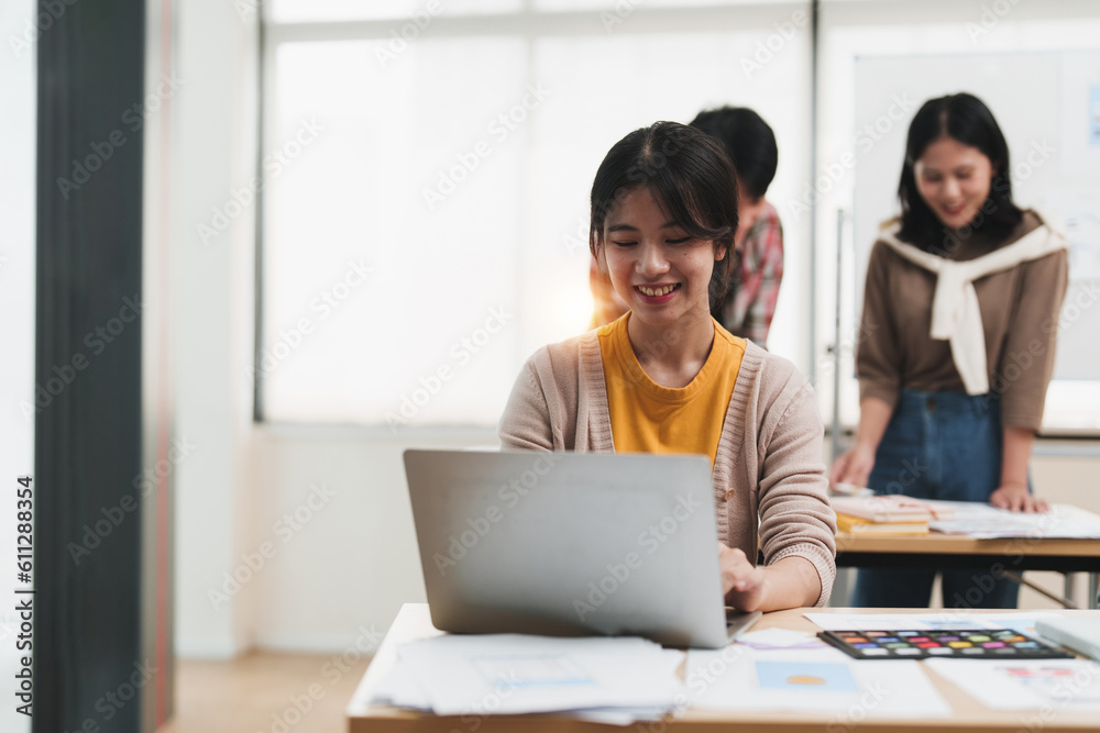 Team of ux developer and ui designer brainstorming interface wireframe design.Creative digital development agency Team of ux developer and ui designer brainstorming interface wireframe design.Creative digital development agency