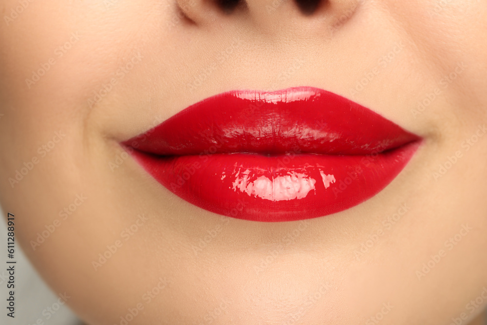 Fototapeta premium Closeup view of woman with red lipstick