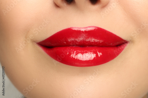 Closeup view of woman with red lipstick