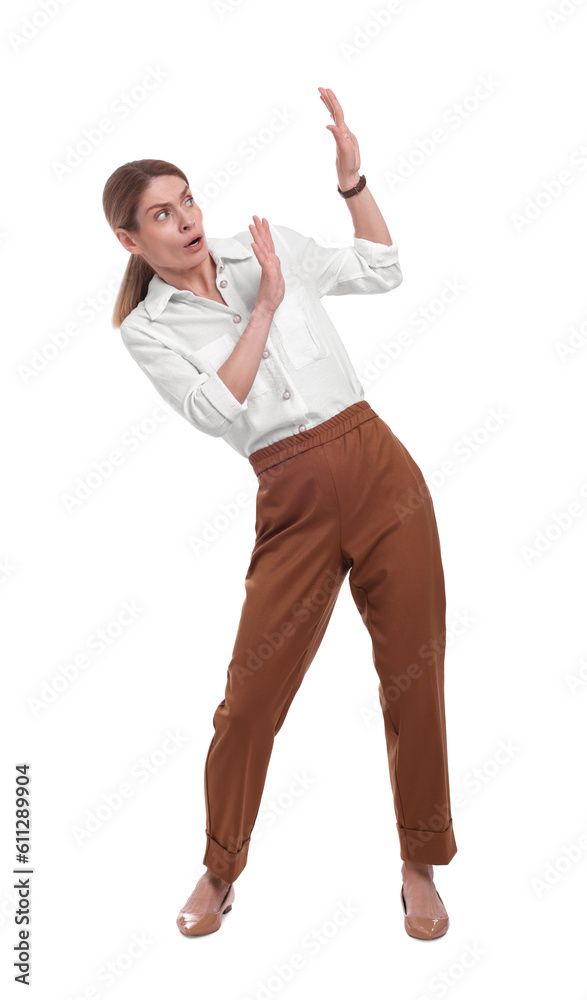 Beautiful businesswoman avoiding something on white background Beautiful businesswoman avoiding something on white background