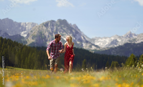 Man and woman freedom on summer travel vacation.Happy man and girl enjoying together