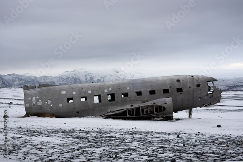 The abandoned DC-3 Airplane on Solheimasandur beach, a Douglas Dakota DC3 used by the US Navy, lies as wreckage on the striking black sand beach of South Iceland фототапет