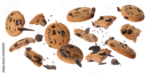 Delicious chocolate chip cookies and pieces of chocolate falling on white background