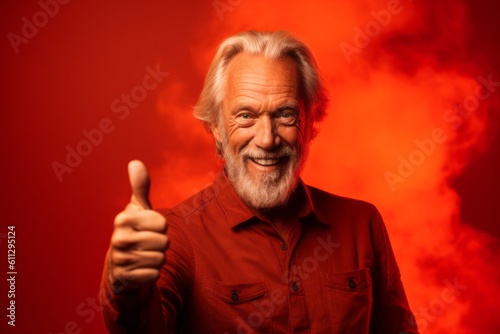 Medium shot portrait photography of a glad mature man raising both thumbs up against a fiery red background. With generative AI technology © Markus Schröder