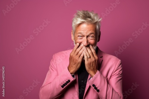 Medium shot portrait photography of a glad mature man making a surprise gesture by covering one s mouth against a hot pink background. With generative AI technology