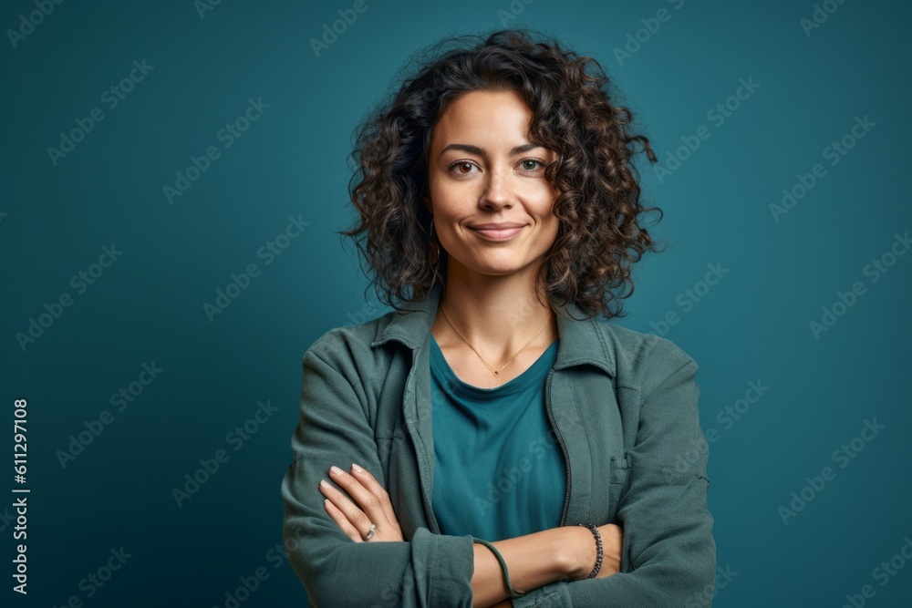 Medium shot portrait photography of a satisfied girl in her 30s crossing the arms against a teal blue background. With generative AI technology Medium shot portrait photography of a satisfied girl in her 30s crossing the arms against a teal blue background. With generative AI technology
