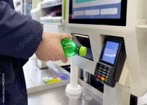 Wallpaper Mural Customer pays his purchase at the supermarket,self checkout systems in  retail stores,Barcode scanner,Self checkout machine Torontodigital.ca