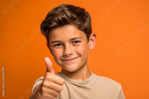 Close-up portrait photography of a beautiful boy in his 30s showing a thumb up against a tangerine orange background. With generative AI technology