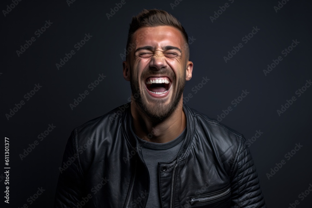 Medium shot portrait photography of a satisfied boy in his 30s laughing against a cool gray background. With generative AI technology Medium shot portrait photography of a satisfied boy in his 30s laughing against a cool gray background. With generative AI technology