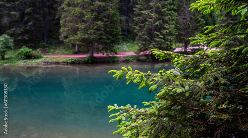 Mountain blue lake water landscape. Braies lake with crystal water in background of mountains. Dolomites, Italy. © eskstock