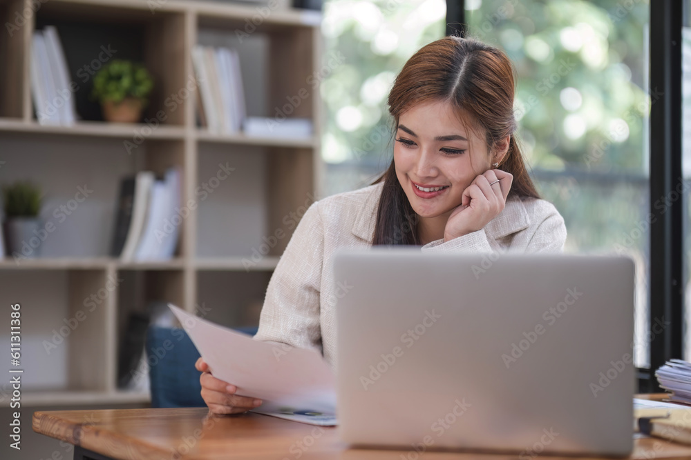 Business woman using calculator for do math finance on wooden desk in office and business working background, tax, accounting, statistics and analytic research concept... Business woman using calculator for do math finance on wooden desk in office and business working background, tax, accounting, statistics and analytic research concept...