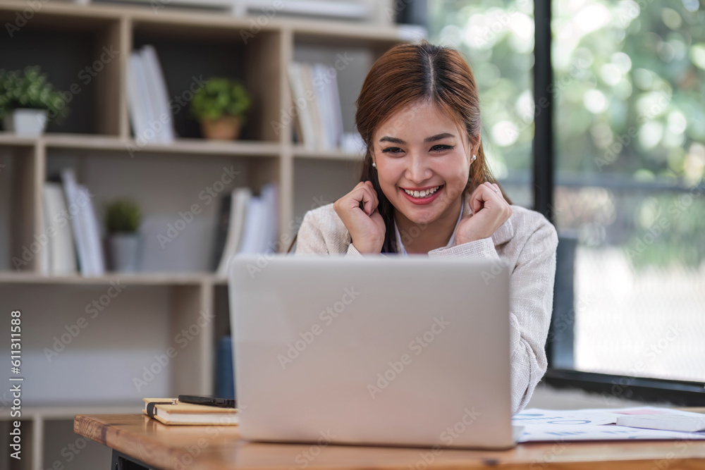 Business woman using calculator for do math finance on wooden desk in office and business working background, tax, accounting, statistics and analytic research concept... Business woman using calculator for do math finance on wooden desk in office and business working background, tax, accounting, statistics and analytic research concept...