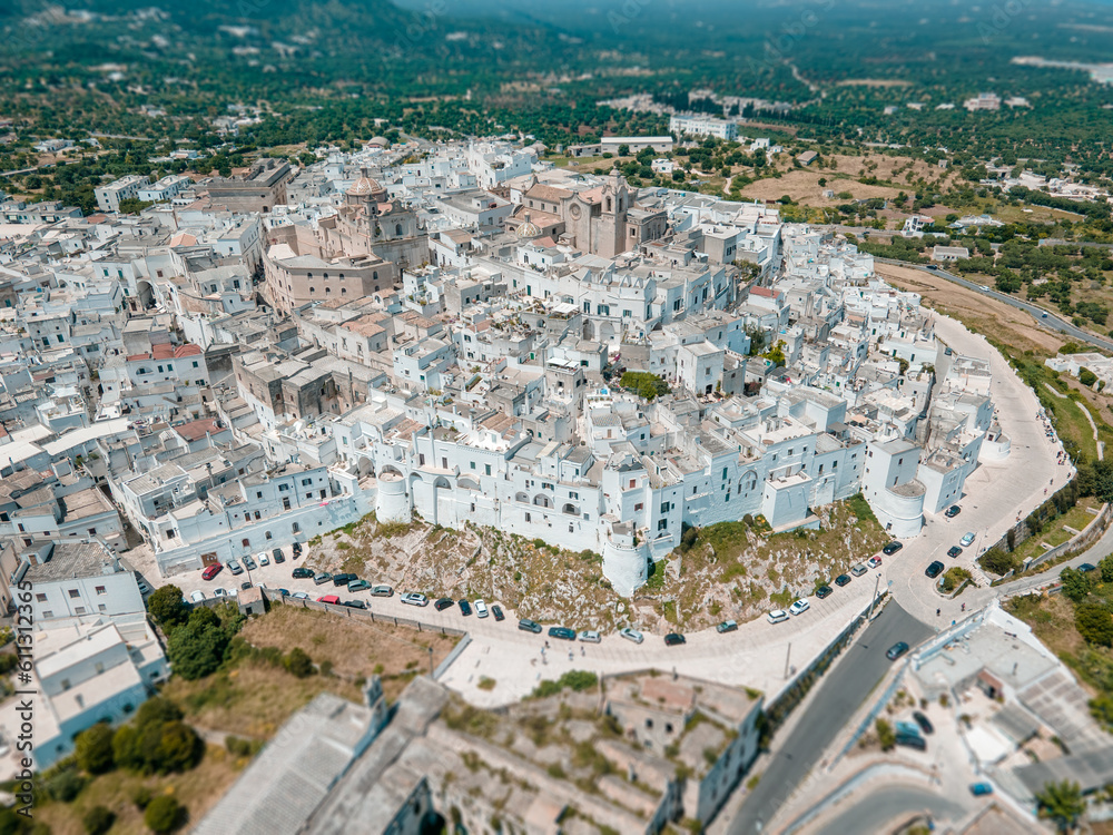 View of Ostuni white town, Brindisi, Puglia, Italy, Europe. Old town in southern Italy. Ostuni is referred to as the White Town. Ostuni white town skyline and church, Brindisi, Italy.