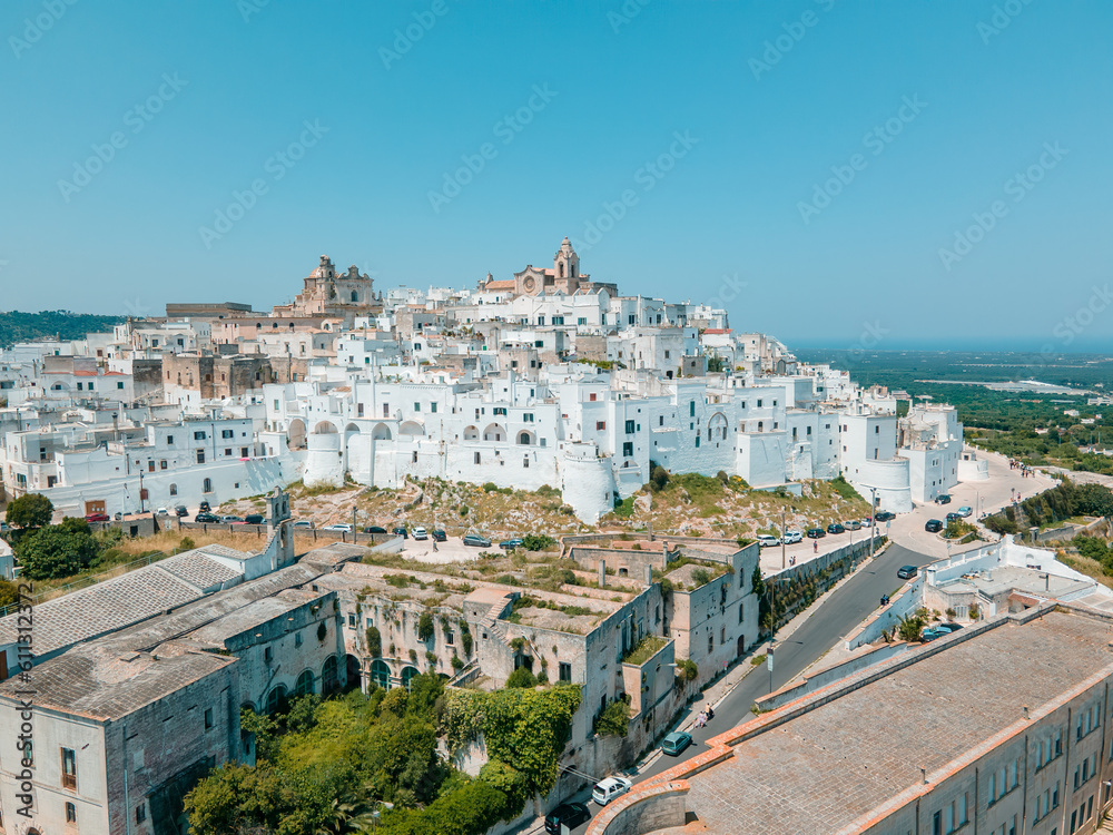 Fototapeta premium Gorgeous view of the historical part of the Puglia region in Italy. White city of Ostuni. Tourist destination in Europe
