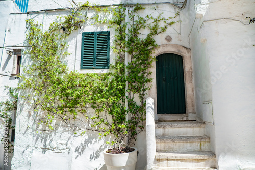Quiet cozy street in the historical part of the white city of Ostuni in the South of Italy
