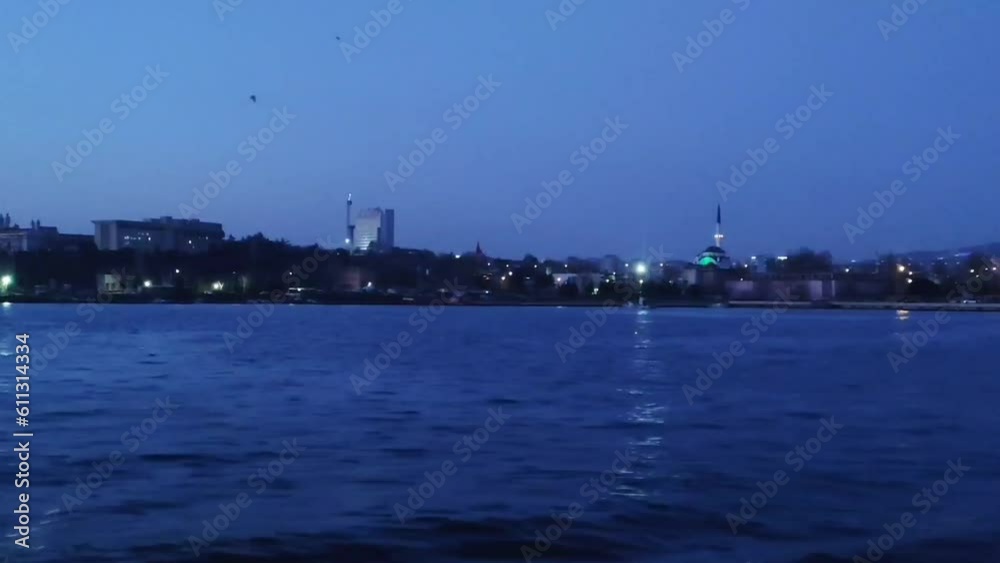 Antalya, Turkey, May 10, 2023. Night blue Mediterranean sea and coast with various city buildings and structures Antalya, Turkey, May 10, 2023. Night blue Mediterranean sea and coast with various city buildings and structures