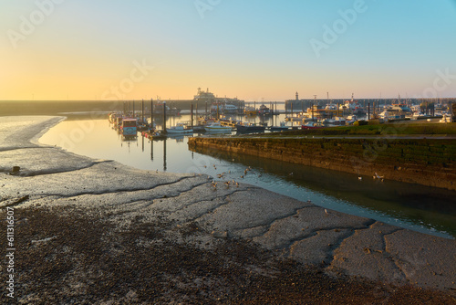 A hazy morning glow at low tide in Ramsgate harbour