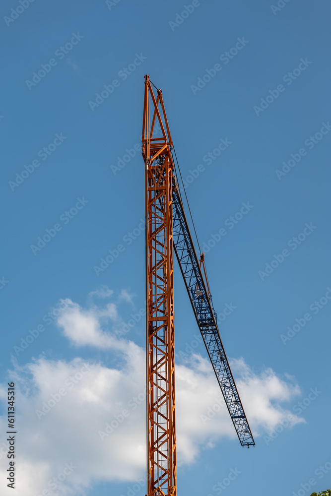 a construction crane with a view of the sky from below a construction crane with a view of the sky from below