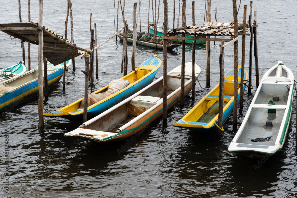 Fishing canoes docked on the Almas River in the city of Taperoa, Bahia.