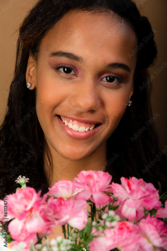 Close-up portrait of pretty teenage girl with bouquet of flowers. Close-up portrait of pretty teenage girl with bouquet of flowers.