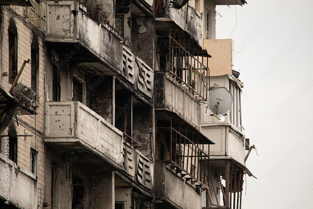 Charred Remnants: Capturing the Devastation on a Multistory Building's Fa ade