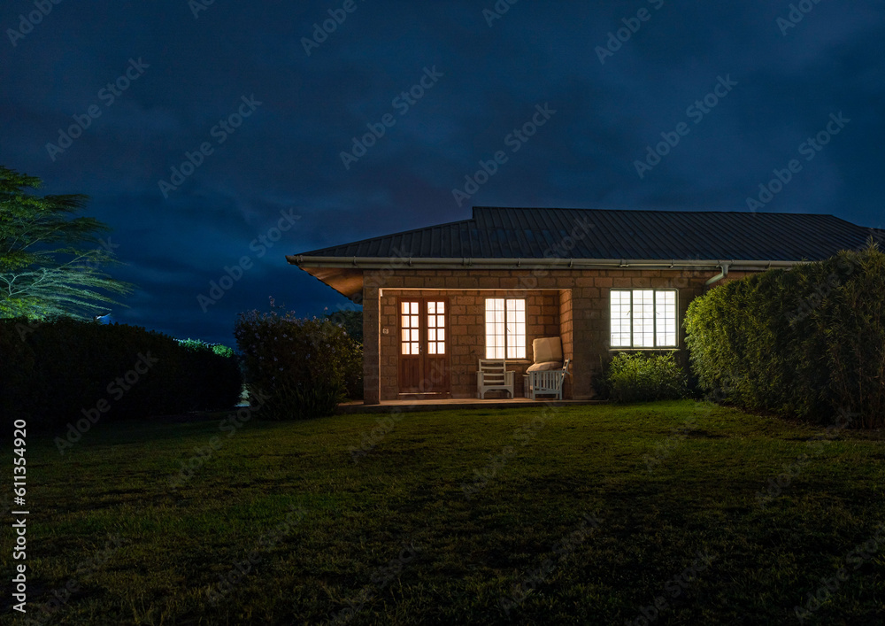 A Captivating House Under the Serene Blue Hour Sky A Captivating House Under the Serene Blue Hour Sky