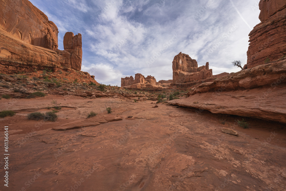 hiking the park avenue trail in arches national park, utah, usa hiking the park avenue trail in arches national park, utah, usa