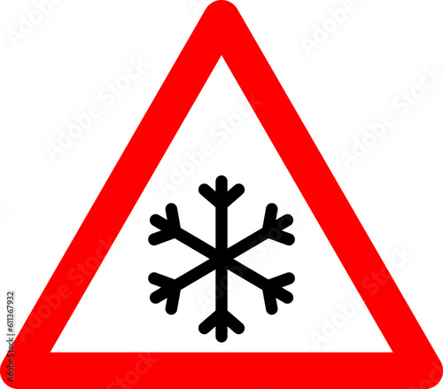 Snowfall sign. Snowfall warning sign. Red triangle sign with a snowflake icon inside. Caution, snowfall, slippery road. Road sign snowfall. Snow and ice sign.