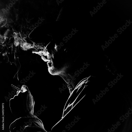 Εκτύπωση καμβά low key portrait of smoking cowboy