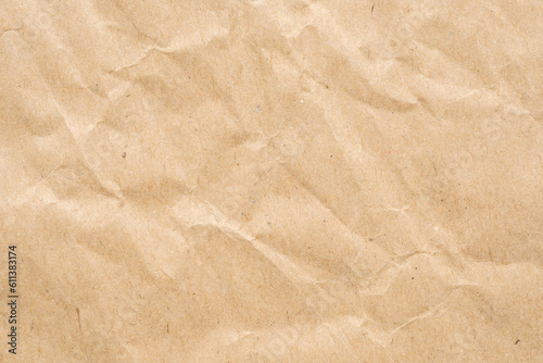 Abstract crumpled and creased recycle brown paper texture background