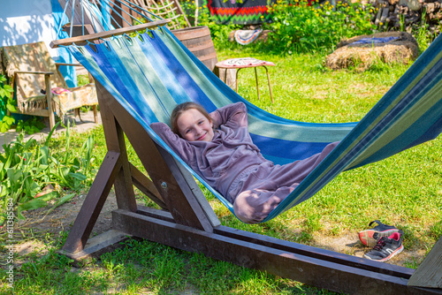 person relaxing on hammock