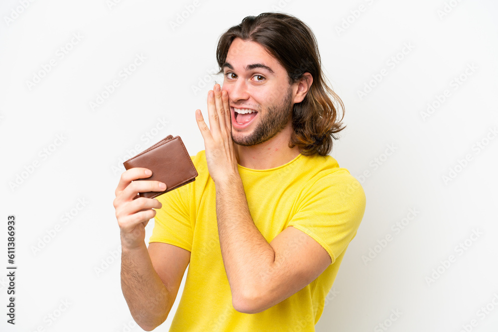 Young handsome man holding a wallet isolated on white background whispering something Young handsome man holding a wallet isolated on white background whispering something