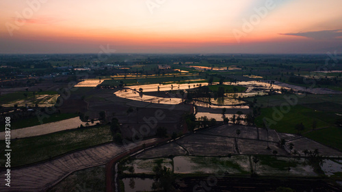 Top view of beautiful terraced rice fields in the water season and irrigation from drone evening light