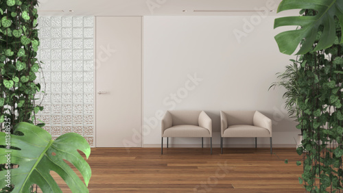 Jungle frame, biophilic concept idea interior design. Tropical leaves over minimal white sitting waiting room with grass brick wall. Cerpegia woodii and monstera deliciosa plants photo