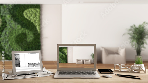 Architect designer desktop concept, laptop and tablet on wooden desk with screen showing interior design project and CAD sketch, sitting waiting room with vertical garden © ArchiVIZ