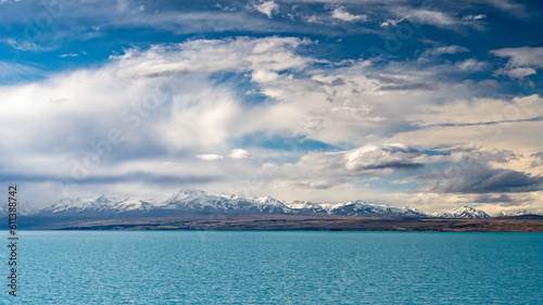 Konstfotografi A scenic landscape of Aoraki Mount Cook background - Lake Pukaki with blue sky and clouds, South Island, New Zealand