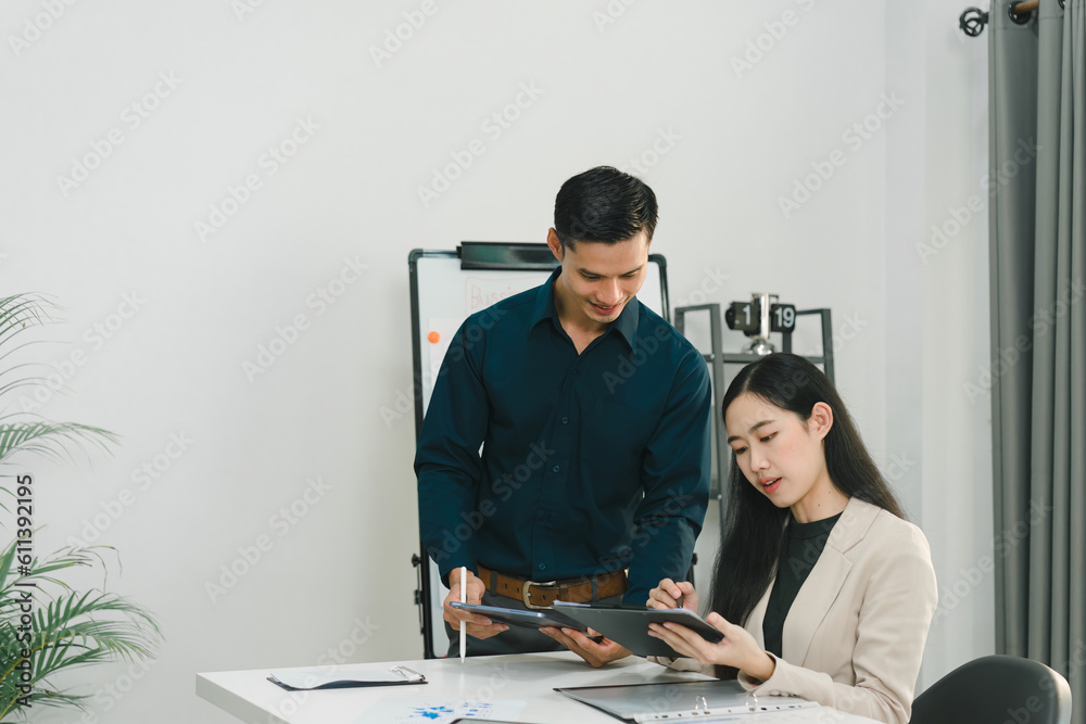 Businesspeople are using digital laptops to share ideas at the meeting startup work. Brainstorming concept. Businesspeople are using digital laptops to share ideas at the meeting startup work. Brainstorming concept.