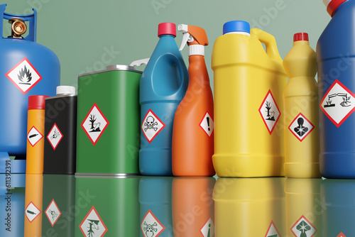 Plastic bottles and metallic tins having with different hazardous warning labels. Illustration of the concept of alert of chemical classification photo