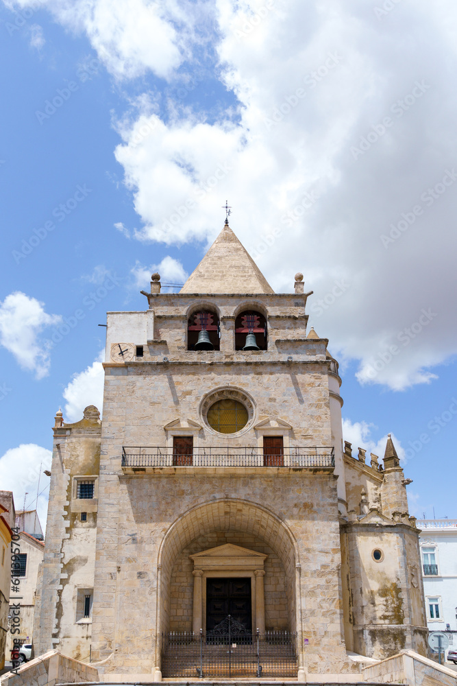 cathedral entrance facade arch and bell tower