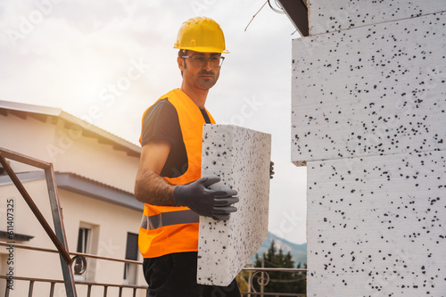 Polystyrene thermal cladding for energy saving on a construction site photo