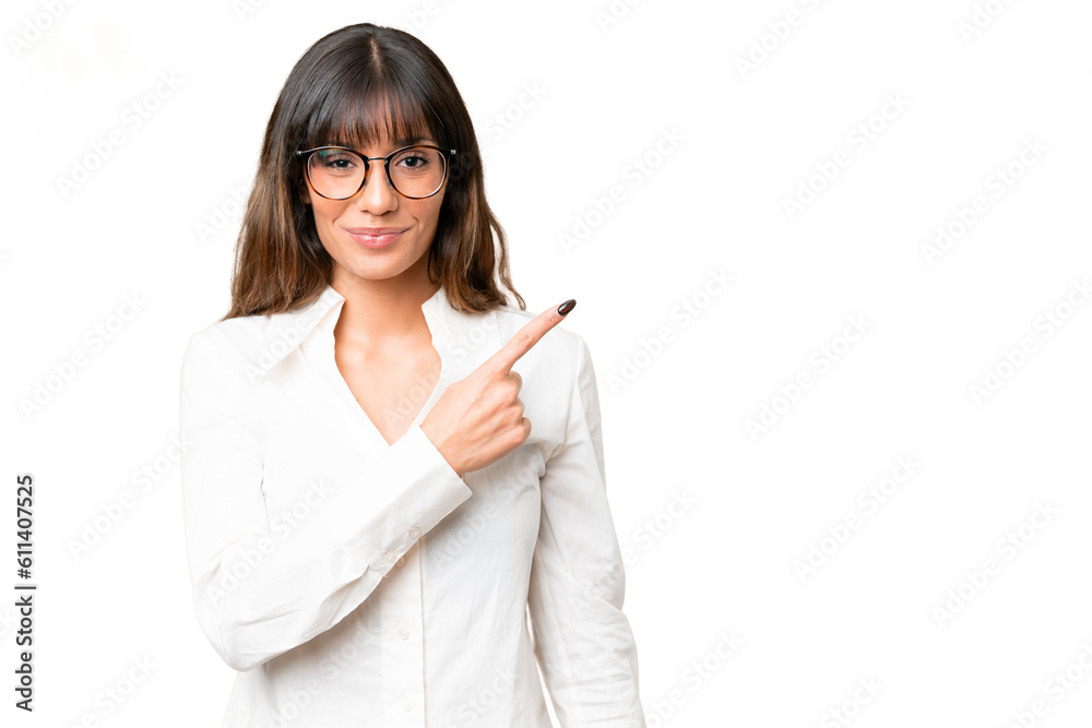Young caucasian woman over isolated chroma key background pointing to the side to present a product Young caucasian woman over isolated chroma key background pointing to the side to present a product