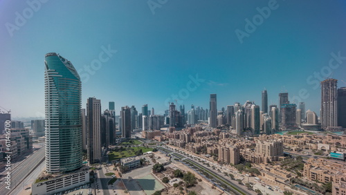 Dubai's business bay towers aerial morning timelapse. Rooftop view of some skyscrapers
